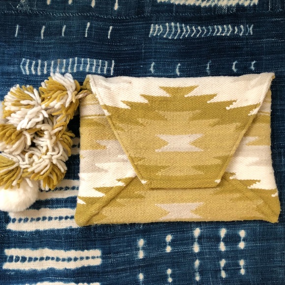 Anthropologie Handbags - Anthropologie Carpet Clutch PomPoms